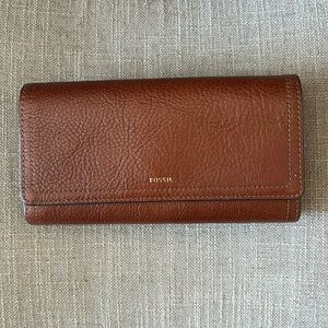 Logan leather RFID flap clutch wallet.